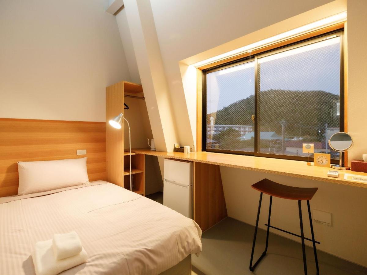 Denpaku Akakina Hotel Амамі Номер фото